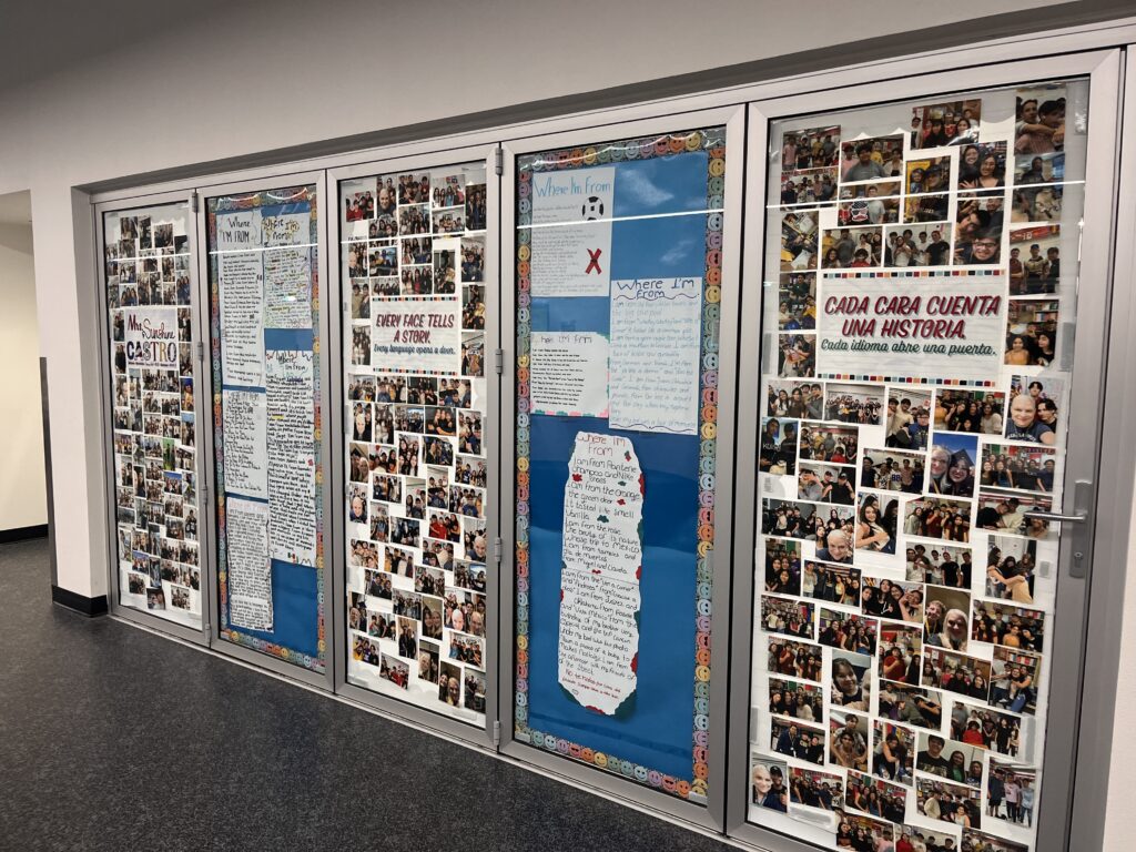 Hallway display with ESL student photos and Where I’m From poems celebrating identity and belonging